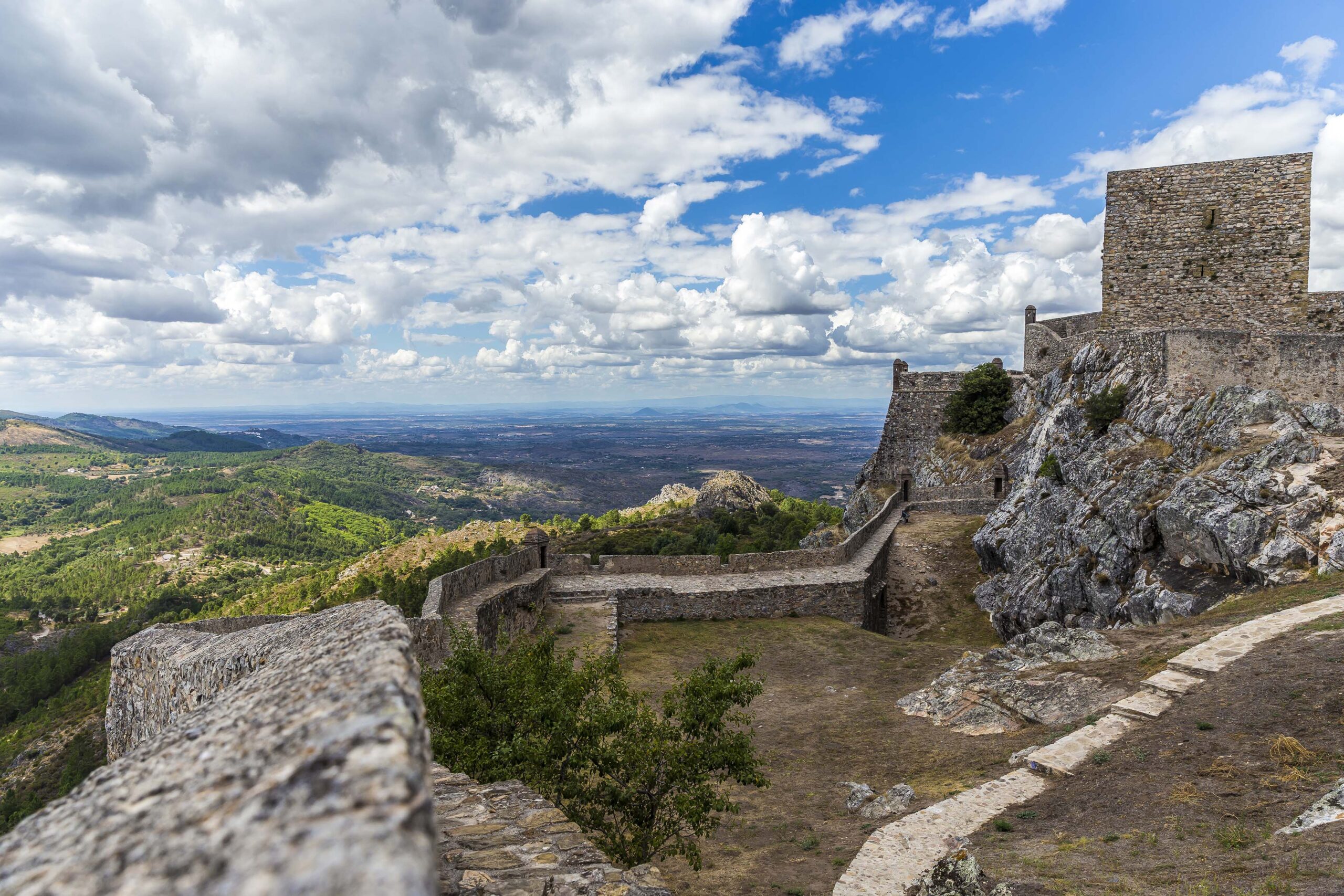 a stone wall with a stone walkway and a stone wall with a stone wall and a stone wall with a stone wall and a stone wall with a stone wall and a stone wall with a stone wall. Marvão, Portugal