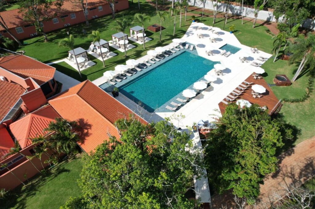 a swimming pool surrounded by trees